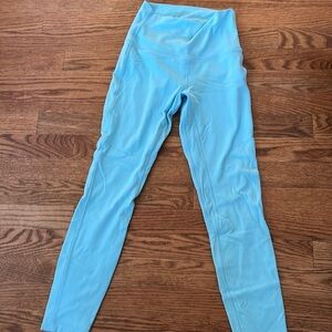 lululemon leggings in neon light blue/teal size 4